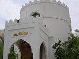 Muscat 02 Muscat 02 Bait al Zubair Outside In a beautifully restored house, the Bait al Zubair museum exhibits Omani heritage in photographs and displays of traditional handicrafts and furniture. It was re-built to reflect the style of the original house and traditional Omani architectural design. Omani architecture is known for its simplicity and beauty, and elements of this have been used within the museum. Here is the entrance.